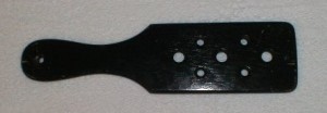 black_paddle_with_holes